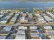 Wide aerial shot of a mobile home community featuring a central clubhouse and pool area at 6719 Canterbury Ne Dr, Winter Haven, FL 33881