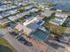 Aerial view of the community, showcasing residences and amenities including a pool at 6719 Canterbury Ne Dr, Winter Haven, FL 33881