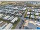 An aerial view of a mobile home community, showcasing the neat rows of residences at 6719 Canterbury Ne Dr, Winter Haven, FL 33881