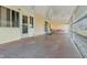 Spacious covered patio with outdoor seating, perfect for relaxing and entertaining at 6719 Canterbury Ne Dr, Winter Haven, FL 33881