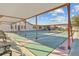 Well-maintained shuffleboard court under a covered area at 6719 Canterbury Ne Dr, Winter Haven, FL 33881