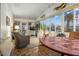 Inviting sunroom filled with natural light and cozy seating, ideal for relaxation at 6719 Canterbury Ne Dr, Winter Haven, FL 33881