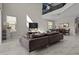 Spacious living room boasts soaring ceilings, comfortable seating, and an adjacent dining area at 718 Whistling Straits Blvd, Davenport, FL 33896