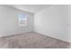 Bedroom with neutral carpet and a window with horizontal blinds at 7521 Stone Creek Trl, Kissimmee, FL 34747