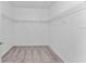 Walk-in closet with wire shelving and neutral carpeting at 7521 Stone Creek Trl, Kissimmee, FL 34747