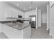 Well-equipped kitchen features stainless steel appliances and modern finishes at 7521 Stone Creek Trl, Kissimmee, FL 34747