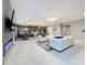 Open concept living space with modern kitchen and stylish living area at 7641 Modica St, Clermont, FL 34714