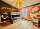 Themed bedroom with bunk beds, Star Wars decor, and unique lighting fixtures at 7670 Otterspool St, Kissimmee, FL 34747