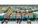 Scenic aerial view highlighting a charming home with lush landscaping in a vibrant community at 8012 Lost Shaker Ln, Kissimmee, FL 34747