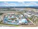 This aerial showcases the water park with multiple restaurants and hotels in the background at 8012 Lost Shaker Ln, Kissimmee, FL 34747