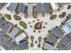 Aerial shot of playground surrounded by colorful homes and lush landscaping in planned community at 8012 Lost Shaker Ln, Kissimmee, FL 34747