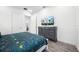 Serene bedroom boasts a comfortable bed, ample storage, and a relaxing atmosphere at 8012 Lost Shaker Ln, Kissimmee, FL 34747