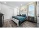 Tranquil bedroom featuring a comfortable bed, soft lighting, and a serene ambiance at 8012 Lost Shaker Ln, Kissimmee, FL 34747
