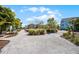 Picturesque community space showcasing lush tropical landscaping and a walking path at 8012 Lost Shaker Ln, Kissimmee, FL 34747