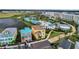 Colorful two-story vacation rental homes near a picturesque lake offer a vibrant and inviting retreat at 8012 Lost Shaker Ln, Kissimmee, FL 34747