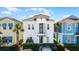 Stunning two-story home with charming elevation, balcony, and well-manicured landscaping at 8012 Lost Shaker Ln, Kissimmee, FL 34747