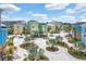 Charming street view of a colorful residential area with a playground and tropical landscaping at 8012 Lost Shaker Ln, Kissimmee, FL 34747