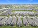 Aerial view showcasing a residential community with ponds at 806 Via Como St, Poinciana, FL 34759