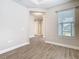 An empty bedroom featuring tile floors, recessed lights, and baseboard trim at 806 Via Como St, Poinciana, FL 34759