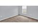 Neutral bedroom with clean carpet, white trim, and a bright window at 923 Tramells Trl, Kissimmee, FL 34744