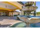 Close up of the fountain in front of the Watersong clubhouse, showcasing the architecture and manicured landscape at 113 Tiger Lily Ct, Davenport, FL 33837
