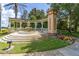 The Watersong community entrance features a tiered fountain and professionally maintained landscaping at 113 Tiger Lily Ct, Davenport, FL 33837