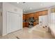 Bright kitchen with stainless appliances, generous cabinets, and tile floors at 113 Tiger Lily Ct, Davenport, FL 33837