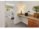 Office niche with a desk area, a view into the bedroom, and a potted plant on the desk at 113 Tiger Lily Ct, Davenport, FL 33837