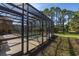 Enjoy the screened in pool and backyard with a spa and ample outdoor space at 113 Tiger Lily Ct, Davenport, FL 33837