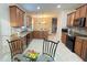 Modern kitchen with stainless steel appliances, granite countertops, and tile flooring at 14112 Queenside St, Orlando, FL 32824