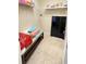 Practical walk-in closet with shelving and storage space, ideal for organization at 14112 Queenside St, Orlando, FL 32824