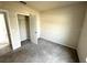 Neutral bedroom featuring carpet, a closet, and a bright, airy atmosphere at 1629 Ambar Ct, Winter Haven, FL 33881