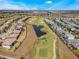 Beautiful aerial view of the community and golf course, showcasing the attractive landscaping and well-maintained grounds at 1646 Moon Valley Dr, Davenport, FL 33896