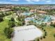 Beautiful community with golf course, pool, volleyball court, and other amenities at 1646 Moon Valley Dr, Davenport, FL 33896