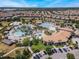 Stunning aerial view of community pool, lazy river, and clubhouse at 1646 Moon Valley Dr, Davenport, FL 33896