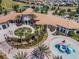 Impressive clubhouse with a pool, fountain and playground at 1646 Moon Valley Dr, Davenport, FL 33896