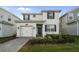 Charming two-story home with well-kept landscaping, paver driveway and a one car garage at 1646 Moon Valley Dr, Davenport, FL 33896