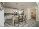 Beautiful kitchen featuring granite countertops, an island with barstool seating, and stainless steel appliances at 1646 Moon Valley Dr, Davenport, FL 33896