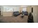 Upstairs living room area featuring comfortable seating, contemporary décor, and lots of natural light at 1646 Moon Valley Dr, Davenport, FL 33896