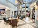 Welcoming lobby area featuring comfortable seating, stylish decor, and ample natural light at 1646 Moon Valley Dr, Davenport, FL 33896