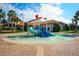 Community splash pad featuring a slide, buckets, sprayers, and a brick paver base at 1646 Moon Valley Dr, Davenport, FL 33896