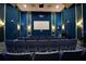 Community theater featuring comfortable seating and a large screen, great for movie nights at 1646 Moon Valley Dr, Davenport, FL 33896