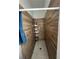 Step-in shower featuring wood-look tile and modern fixtures at 1664 Redfin Dr, Kissimmee, FL 34759