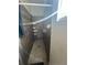 Step-in shower featuring wood-look tile and modern fixtures at 1664 Redfin Dr, Kissimmee, FL 34759