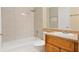 This remodeled bathroom boasts shower and tub with sleek tile, modern fixtures, and a vanity with countertop at 1695 Lee Rd # E103, Winter Park, FL 32789