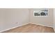 Cozy bedroom with natural light, neutral walls and clean, modern floors at 1695 Lee Rd # E103, Winter Park, FL 32789