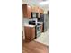 Modern kitchen with stainless steel appliances, ample cabinet space, and light countertops at 1695 Lee Rd # E103, Winter Park, FL 32789