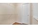 Simple walk-in closet with wire shelving that maximizes space for storage and organization at 1695 Lee Rd # E103, Winter Park, FL 32789
