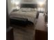 Bedroom with elegant decor features lamps and ample natural light at 1749 Fulfillment Dr, Kissimmee, FL 34744