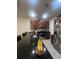 Spacious kitchen featuring dark wood cabinetry, stainless steel appliances, and ample counter space at 1749 Fulfillment Dr, Kissimmee, FL 34744